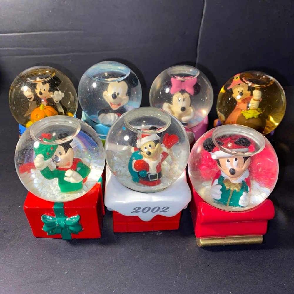 Lot Of (7) Disney Mini Seasonal Snow Globes Halloween Christmas Easter